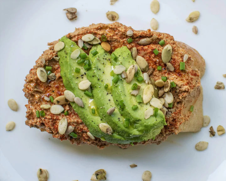 Smoky Sunflower Seed Hummus On Toast With Avocado And Go Raw Sprouted Sunflower Seeds