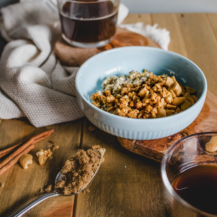 Spoonful Of Organic Brown Sugar And Granola Breakfast With Organic Coffee From Terra Powders