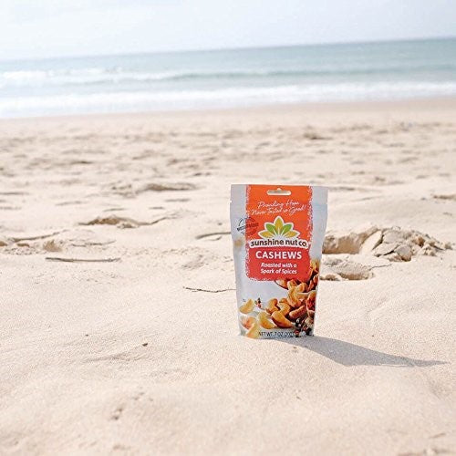 Bag Of Roasted Spicy Cashews On The Beach Sand From Sunshine Nut Co. Spark Of Spices Healthy Beach Day Snack Food