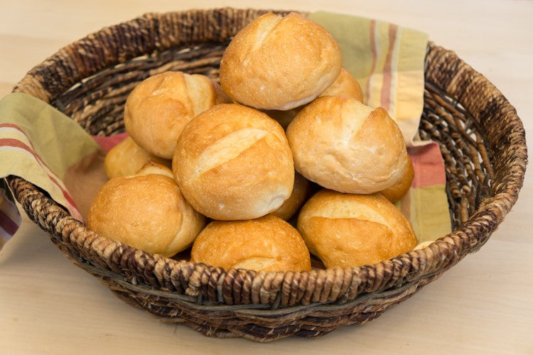 Basket Of Fresh Baked French Dinner Rolls From The Essential Baking Company