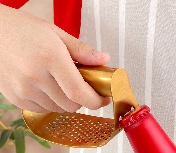 Using Gold Bottle Cap Opener On 2 Tools In 1 Kitchen Garlic Rocker Style Press