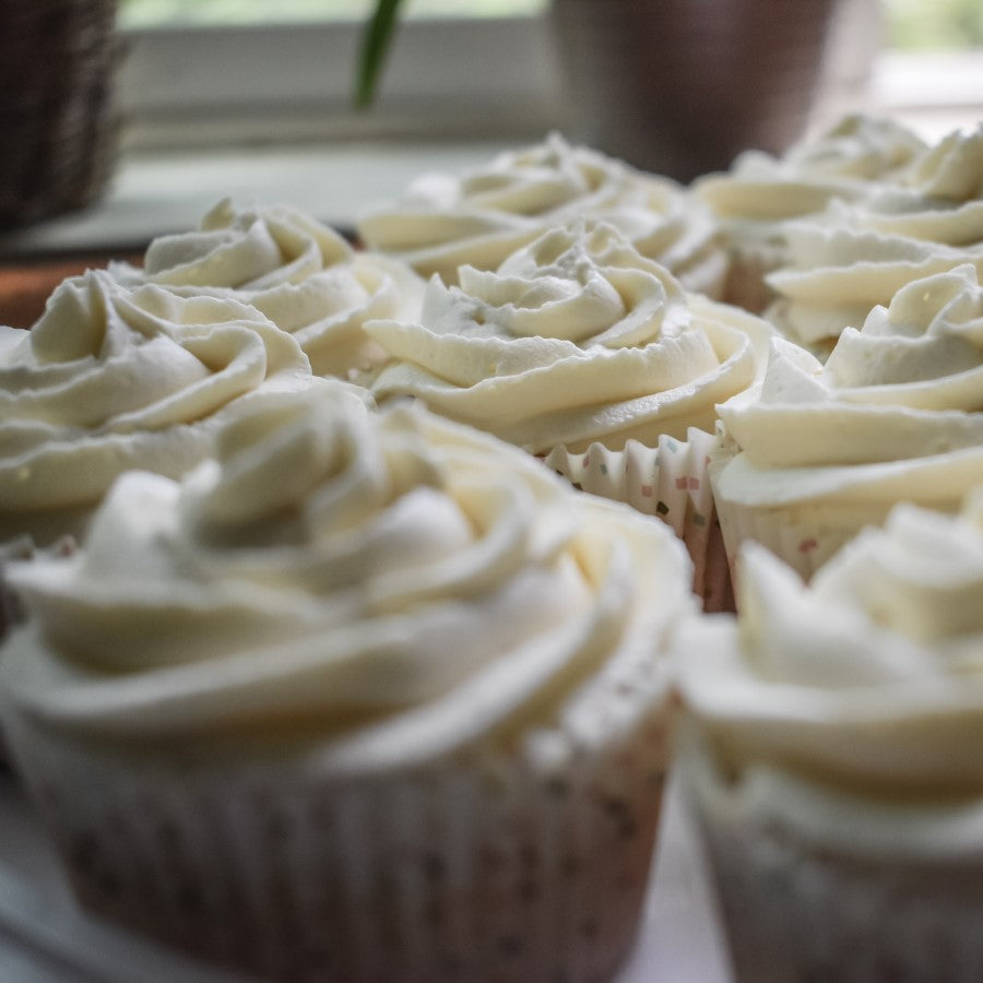 Vanilla Frosting Topped Cupcakes Made With Organic Madagascar Vanilla Extract