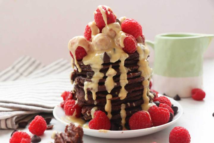 85% Cacao Pascha Recipe Vegan Chocolate Pancakes Topped With Fresh Raspberries