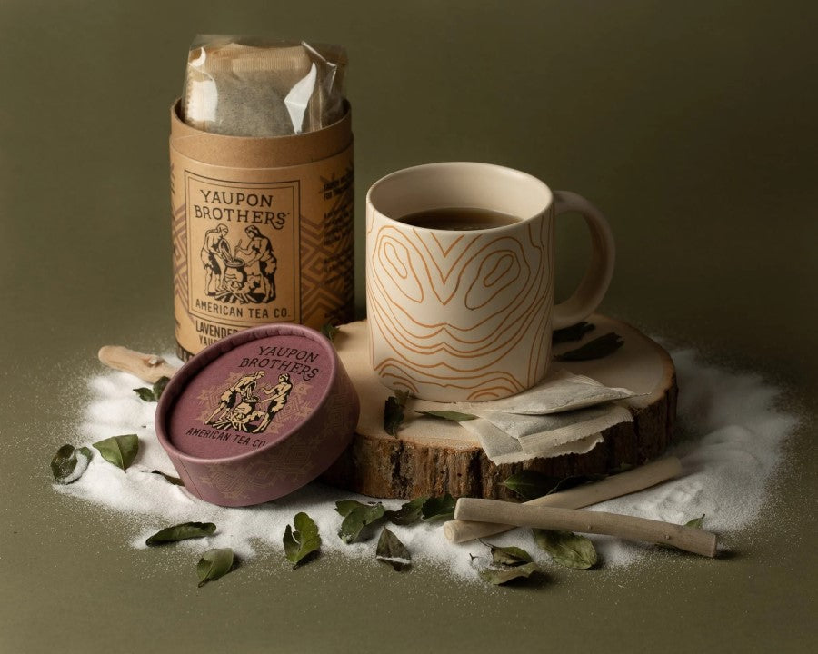 Mug Of Hot Tea Yaupon Brothers American Tea Co. Lavender Coconut Yaupon Holly Tea Eco Tube And Compostable Tea Bags