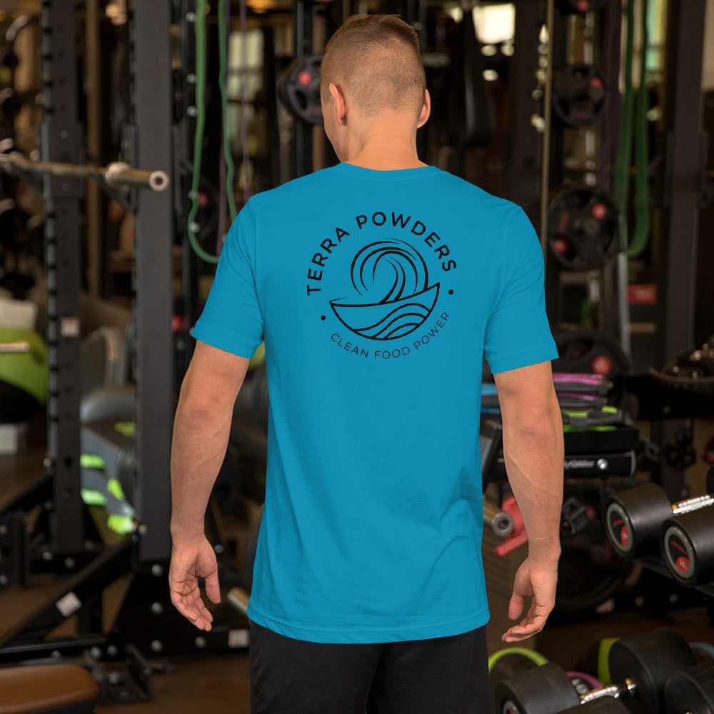 Man In Gym Working Out In Terra Powders Clean Food Powered Aqua Blue Short Sleeve Shirt With Terra Powders Logo On Back