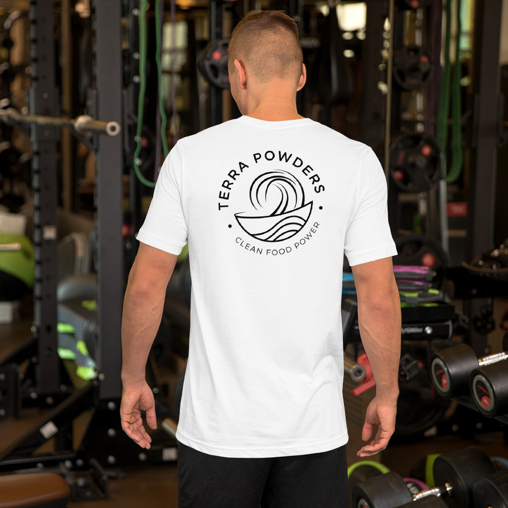Man In Gym Working Out In Terra Powders Clean Food Powered White Short Sleeve Shirt With Terra Powders Logo On Back